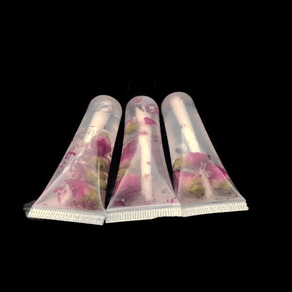 For all 3 /$15  Essentials Lip glosses with rose flower buds - Picture 2 of 8